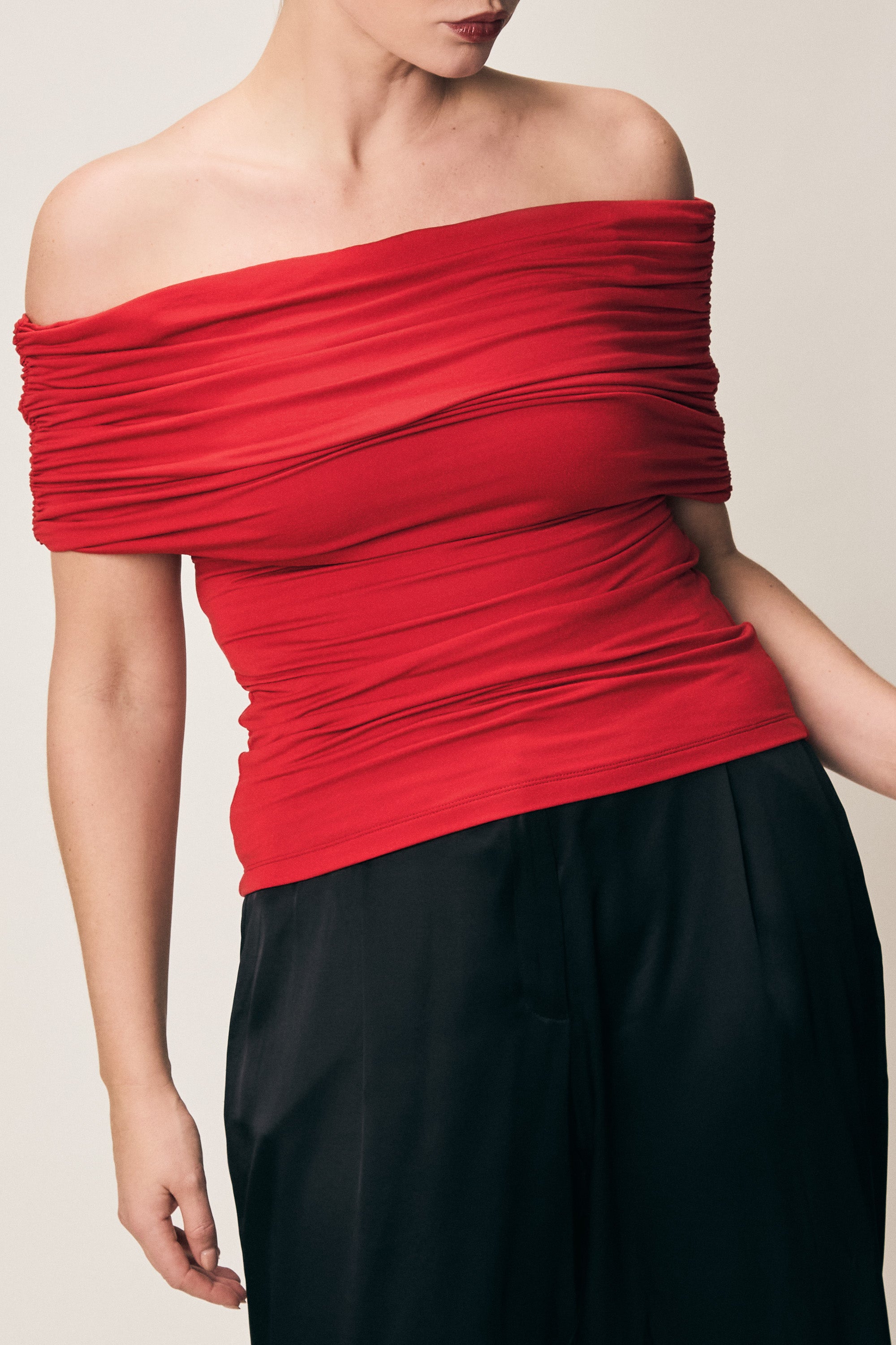 VIVEH Dosinia top in Black – styled view