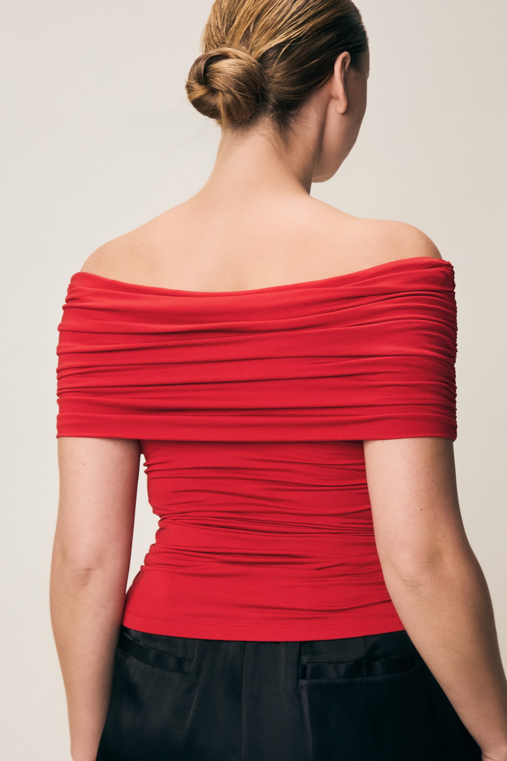 VIVEH Dosinia top in Black – styled view